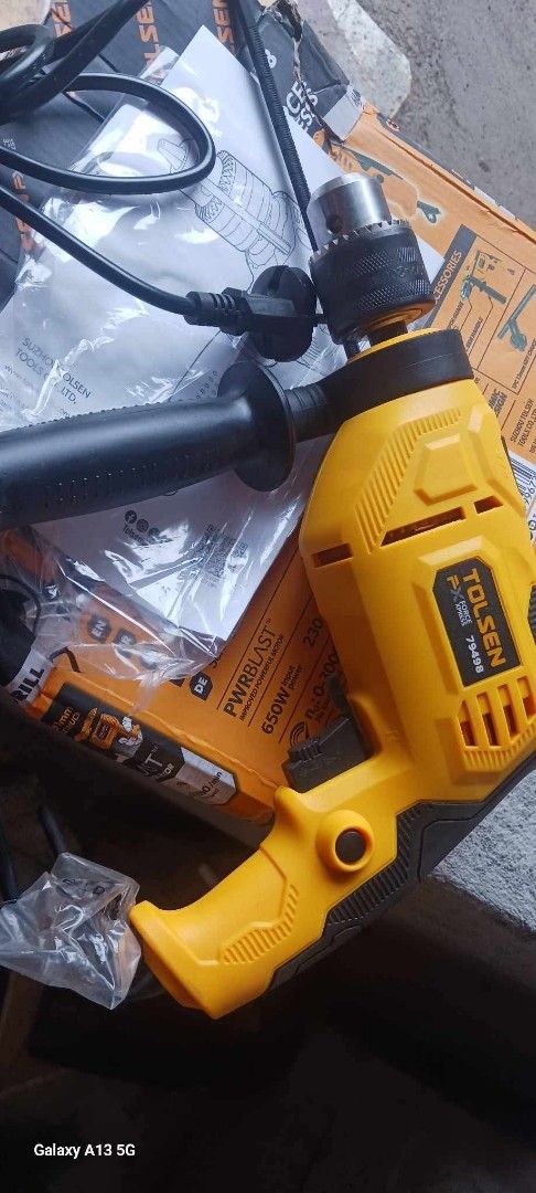 Tolsen Force Xpress 650W Hammer Drill 79498 (Category: Construction Tools & Equipment) located in Cebu City. Submitted by joecristinesayson (Listing ID 1466879089, Image 1). Description: - Brand/Model: Tolsen 650W Hammer Drill (Model 79498) cebu city - Color: Yellow and Black - Chuck Size: 13mm key chuck - Performance: Variable speed up to 3000 RPM / 48000 BPM impact rate - Inclusions: Side handle, depth gauge, manual, original box, and warranty 