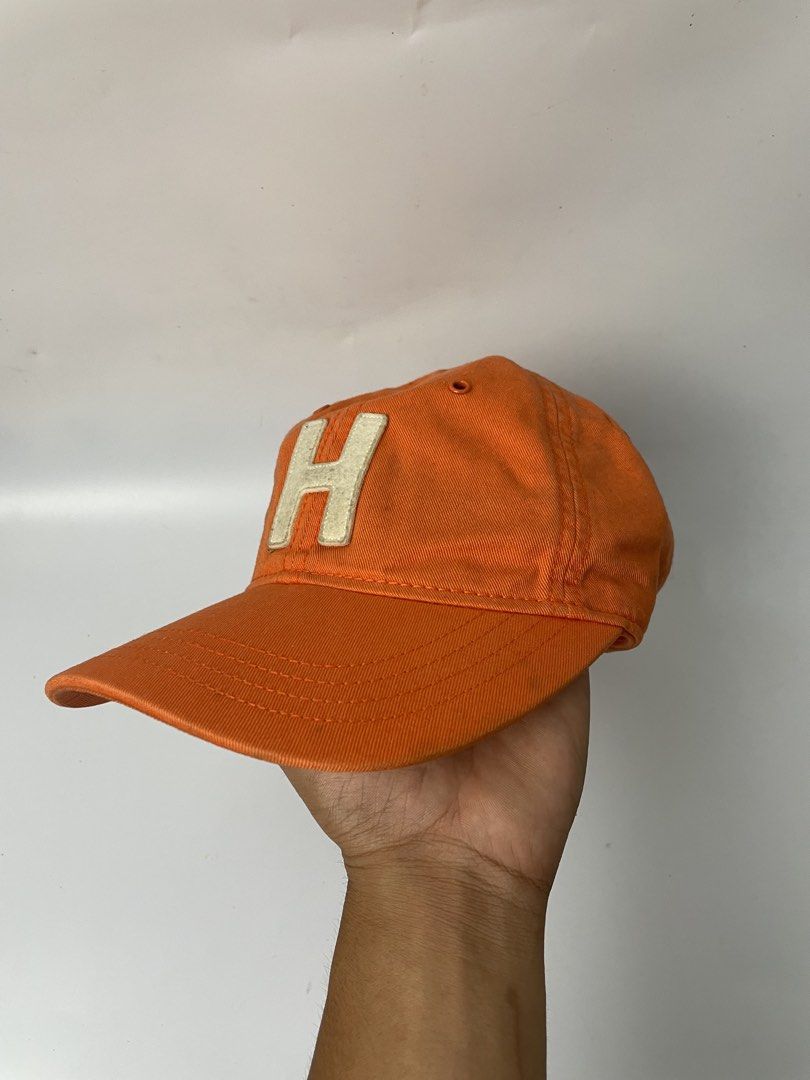 Tommy Hilfiger Orange H Logo Cap (Category: Caps & Hats) located in Manila. Submitted by rdtp2 (Listing ID 1466939517, Image 2). Description: no flaw good conditio 9/10.