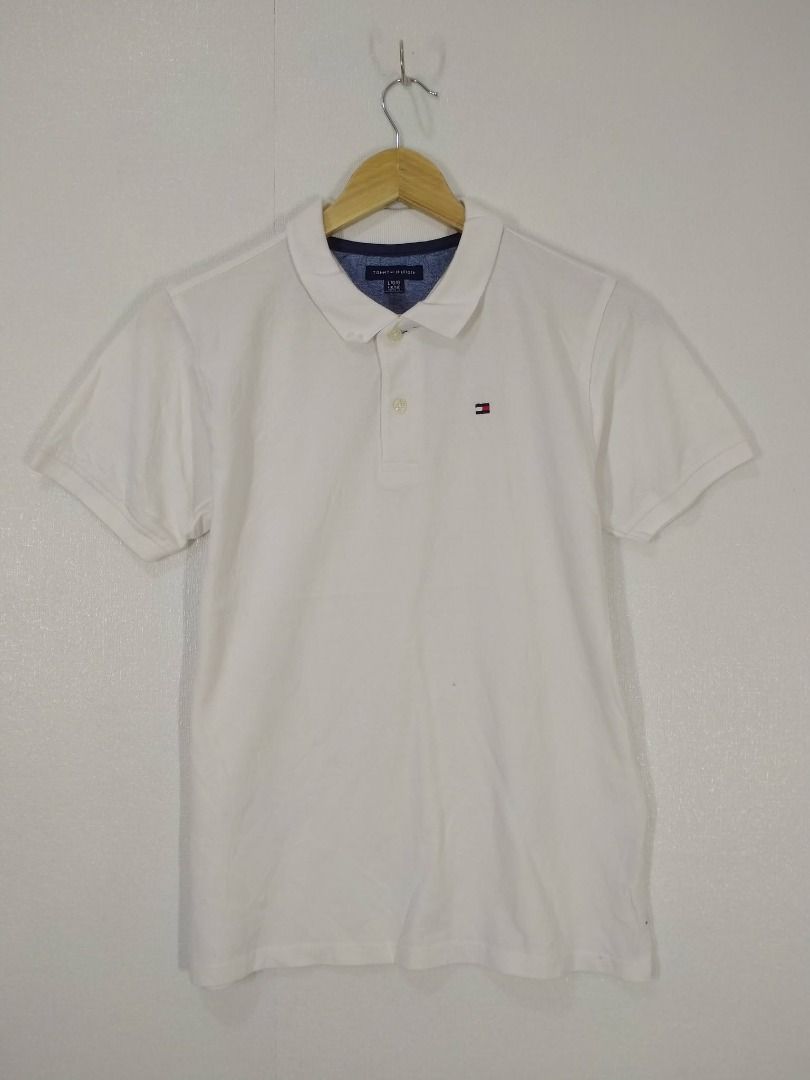 TOMMY HILFIGER POLO SHIRT (Category: Tshirts & Polo Shirts ) located in Baguio. Submitted by fashionfinds1999 (Listing ID 1466821056, Image 1). Description: 25 X 18 SMALL EXCELLENT CONDITION + SHIPPING FEE.