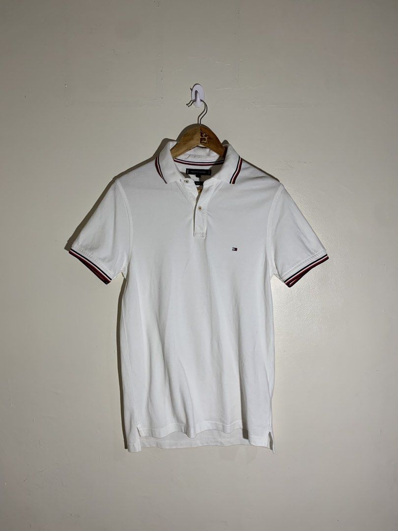 Tommy polo shirt (Category: Tshirts & Polo Shirts ) located in Lapu Lapu. Submitted by fellasgallery11 (Listing ID 1466852568, Image 1). Description: Tommy polo shirt 19.5 width 29 length No issues or flaws.