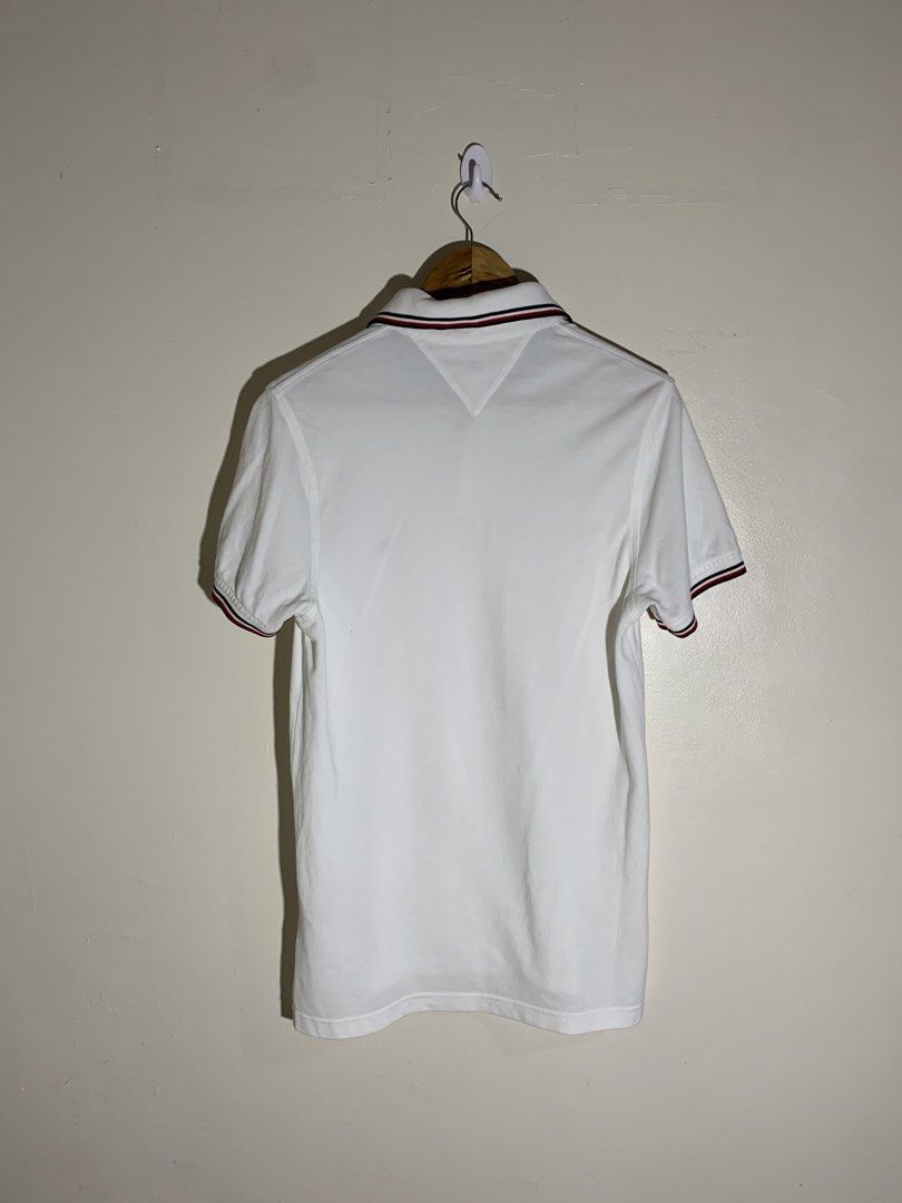 Tommy polo shirt (Category: Tshirts & Polo Shirts ) located in Lapu Lapu. Submitted by fellasgallery11 (Listing ID 1466852568, Image 2). Description: Tommy polo shirt 19.5 width 29 length No issues or flaws.