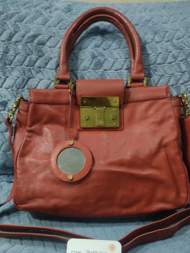Tory Burch Orange Leather Shoulder Bag with Mirror (Category: Luxury Bags & Wallets) located in Cainta. Submitted by kluxurychoices (Listing ID 1466918342, Image 2). Description: Authentic Tory Burch Bag U.S bought.