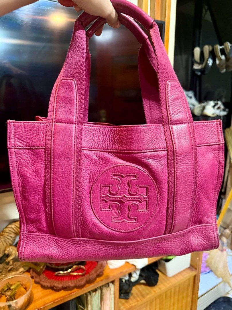Tory Burch pink leather (Category: Luxury Bags & Wallets) located in San Jose del Monte. Submitted by mightyhawk.59282e (Listing ID 1466890770, Image 1). Description: Authentic Tory Burch Ella Leather Micro/Mini Tote Bag - Vibrant Pink Elevate your everyday style with this gorgeous, authentic Tory Burch tote bag in a stunning, vibrant pink hue. Crafted from high-quality pebbled leather, this compact yet spacious bag features the iconic debossed d