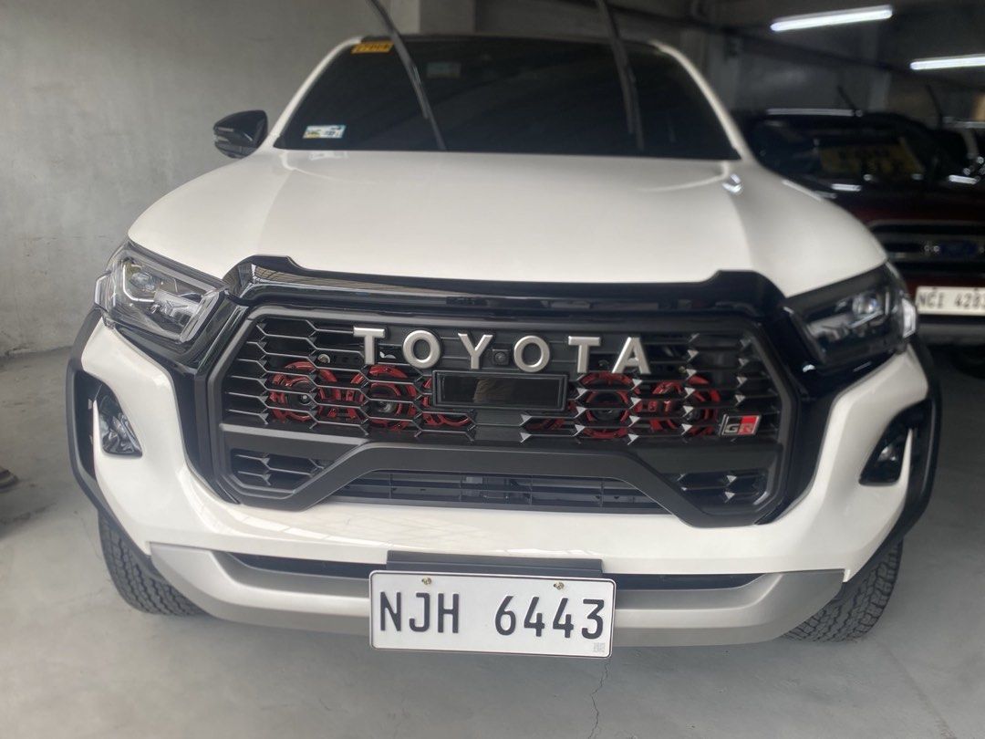 Toyota Hilux GRS Auto (Category: Used Cars) located in Las Pinas. Submitted by psalmgvcof66996 (Listing ID 1466160449, Image 2). Description: 2026 GR HILUX for sale! Bought last April First owner 2026 model (on paper) Deepdish matting Orig toyota rain visor Carbon fiber shift knob Ceramic coated All stock All original Complete papers No issues Smells like bnew 3k mileage only Had it 100% checked up at Toyota Alabang last October 6,2026 (proof at 
