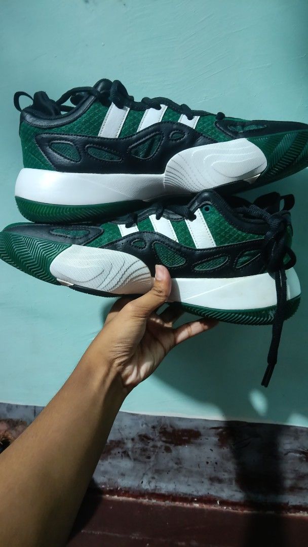 Trae Young Unlimited Green Black Size 9.5 (Category: Sneakers) located in Quezon City. Submitted by khien_plaza (Listing ID 1466885002, Image 1). Description: - Brand/Model: Trae Young Unlimited Adidas Basketball Sneakers - Colorway: Green, Black, and White - Size: US 9.5 / UK 9 / FR 43 1/3 - Material: Mesh upper with supportive leather overlays and chunky white midsole - Sole: Distinctive traction pattern with minimal wear, offering solid grip -