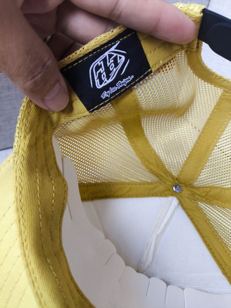 Troy Lee Designs Yellow White Trucker Snapback Hat Cap (Category: Caps & Hats) located in Marikina City. Submitted by headgear_collective (Listing ID 1466782431, Image 3). Description: - Brand: Troy Lee Designs - Color: Vibrant yellow and white - Condition: Clean all around - Design: Classic foam front panel with iconic branding - Comfort: Breathable mesh back panels - Fit: Adjustable black snapback closure - Material: 100% polyester (Made in Ban