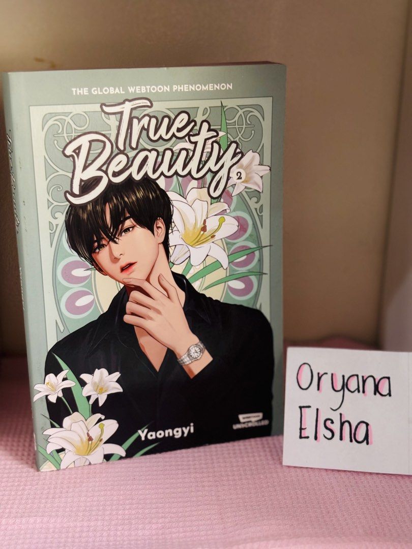 True Beauty Volume 2 by Yaongyi Webtoon Comic (Category: Comics & Manga) located in Manila. Submitted by yanastash (Listing ID 1466809869, Image 1). Description: - Title: True Beauty Volume 2 (English Edition) - Author/Artist: Yaongyi - Publisher: Unicorntrolled - Format: Softcover graphic novel - Cover Art: Suho with white lilies 💳 MOP: PAYMENT FIRST • GCash • BPI • GoTyme • MariBank 📦 SHIPPING / DELIVERY • Lalamove • GrabExpress • J&T • Other