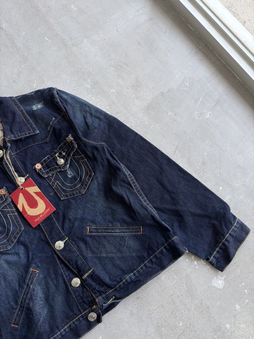 True Religion Jimmy Super T Denim Jacket (Category: Coats, Jackets and Outerwear) located in Santa Rosa. Submitted by lebrownieee (Listing ID 1466863681, Image 3). Description: - Brand: True Religion - Model: Jimmy Super T - Color/Wash: Dark wash denim - Size: XXXL - Material: 100% Cotton, Made in USA - Condition: Brand new with original hang tag attached - Features: Contrast stitching, flap chest pockets, side slant pockets, and logo-stamped met