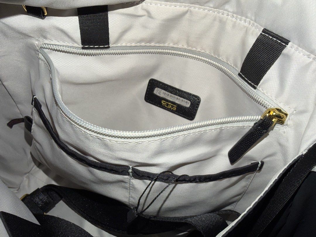 Tumi Hand bag (Category: Cross-body Bags) located in San Jose del Monte. Submitted by outfits_and_more (Listing ID 1466791493, Image 3). Description: Like new condition Used for 1 month only Fits 13inch laptop Durable and water repellant Size: Height-14” Length-16” Width-4” Last price because free shipping.