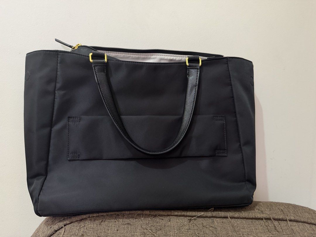 Tumi Hand bag (Category: Cross-body Bags) located in San Jose del Monte. Submitted by outfits_and_more (Listing ID 1466791493, Image 2). Description: Like new condition Used for 1 month only Fits 13inch laptop Durable and water repellant Size: Height-14” Length-16” Width-4” Last price because free shipping.