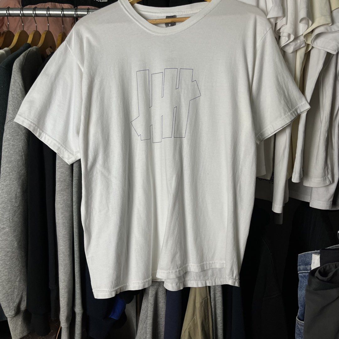 Undefeated (UNDFTD) 5-Strike logo t-shirt (Category: Tshirts & Polo Shirts ) located in Daet. Submitted by wearthriftingcloth. (Listing ID 1466920128, Image 1). Description: 👕UNDEFEATED Size:M Measurement: W21xL27 Issue(s): MINIMAL HAIRLINE Condition: 9.5/10 Color rate: 9/10 ➡️Swipe- to see more detail pic 📌No Deleting/Cancelation‼️ 📌Color may Vary Due to Lighting‼️ 📌Please be responsible buyer Bogus/Flaker will be posted‼️ 📌All ltems Need W