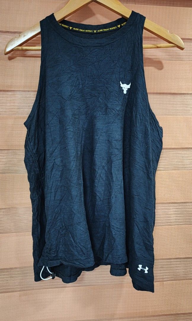 Under Armour Project Rock Charged Tank Top (Category: Activewear) located in Cabuyao City. Submitted by dthrifts (Listing ID 1466862680, Image 1). Description: 20 W 25 L Authentic Excellent Condition.