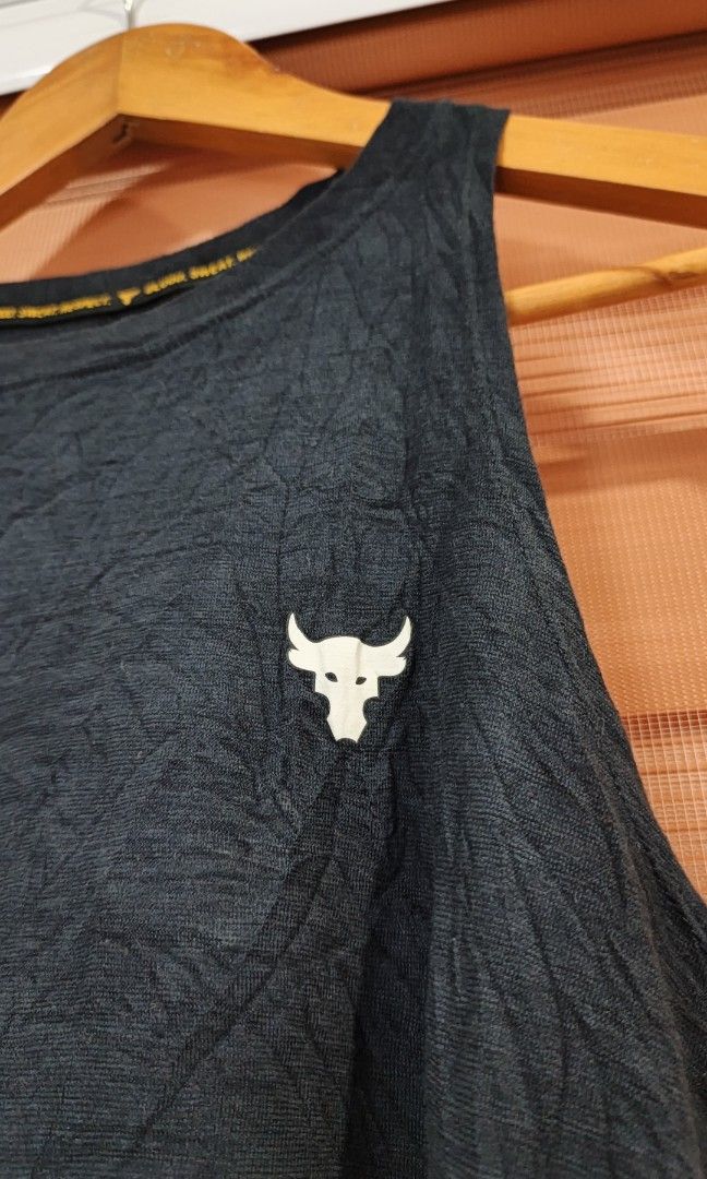 Under Armour Project Rock Charged Tank Top (Category: Activewear) located in Cabuyao City. Submitted by dthrifts (Listing ID 1466862680, Image 2). Description: 20 W 25 L Authentic Excellent Condition.