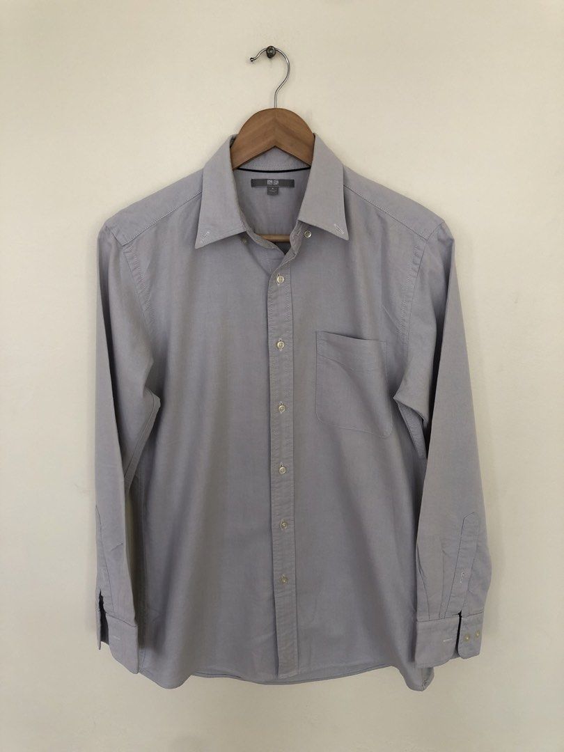Uniqlo Grey Button Up Polo Shirt (Category: Tshirts & Polo Shirts ) located in Manila. Submitted by picklerick_collects (Listing ID 1466812733, Image 1). Description: .