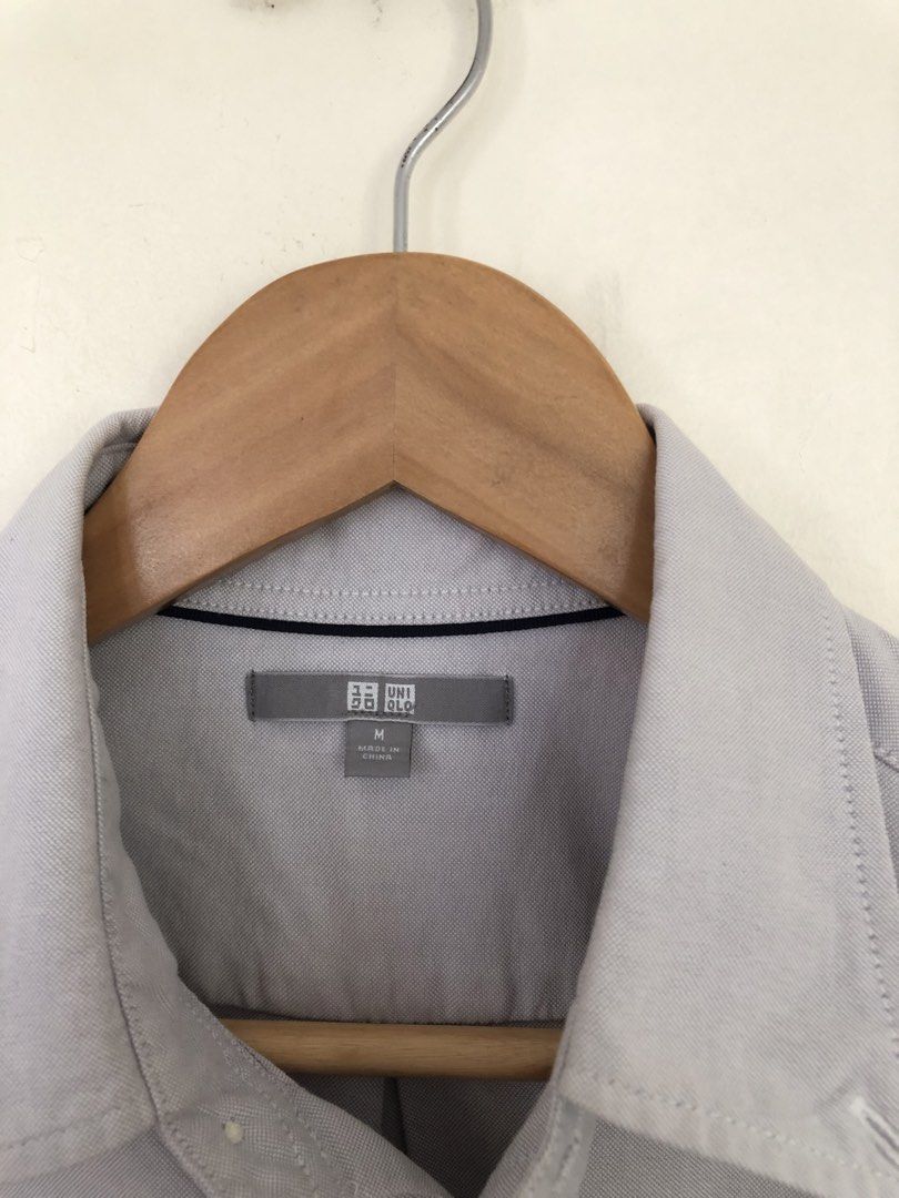 Uniqlo Grey Button Up Polo Shirt (Category: Tshirts & Polo Shirts ) located in Manila. Submitted by picklerick_collects (Listing ID 1466812733, Image 2). Description: .