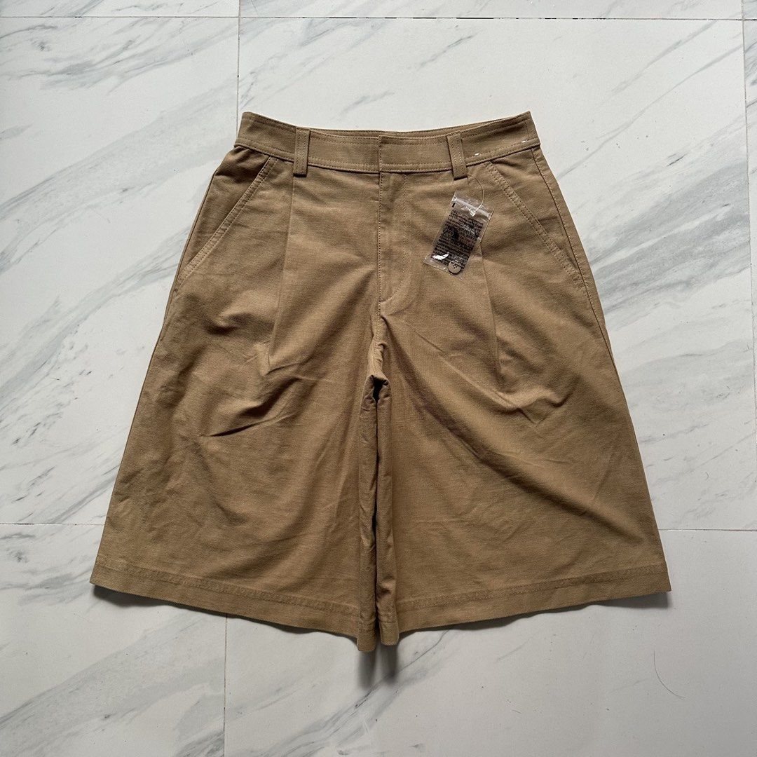 Uniqlo Jorts (Category: Shorts) located in Las Pinas. Submitted by __snow (Listing ID 1466965648, Image 1). Description: • AVAILABLE • Uniqlo Jersey Pleated Long Shorts Size small on tag Beige colorway Dimes by Inches (laid flat) Waist: 28 Rise: 12 Thigh: 14 Length: 22 Leg open: 14 Color rate: 9.5/10 Color may vary due to lighting Payment Method: Gcash Delivery Options (Shipping shoulder by buyer) J&T Express, LBC Location: Las Piñas City.
