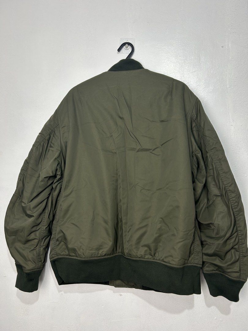 Uniqlo MA-1 Blouson Jacket (Category: Coats, Jackets and Outerwear) located in Antipolo. Submitted by hvevisuals (Listing ID 1466912739, Image 3). Description: Uniqlo MA-1 Blouson Jacket Color: 57 Olive Size: XL * Authentic Uniqlo * In very good condition * Only used once * No stains or damages * No longer available in Uniqlo stores in the Philippines Actual color may vary slightly due to lighting. Feel free to check the item personally or reques
