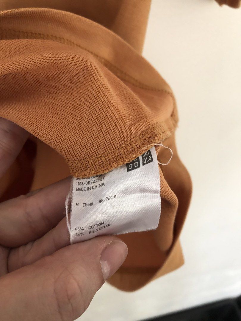 Uniqlo Orange Tee (Category: Tshirts & Polo Shirts ) located in Manila. Submitted by picklerick_collects (Listing ID 1466812488, Image 2). Description: .