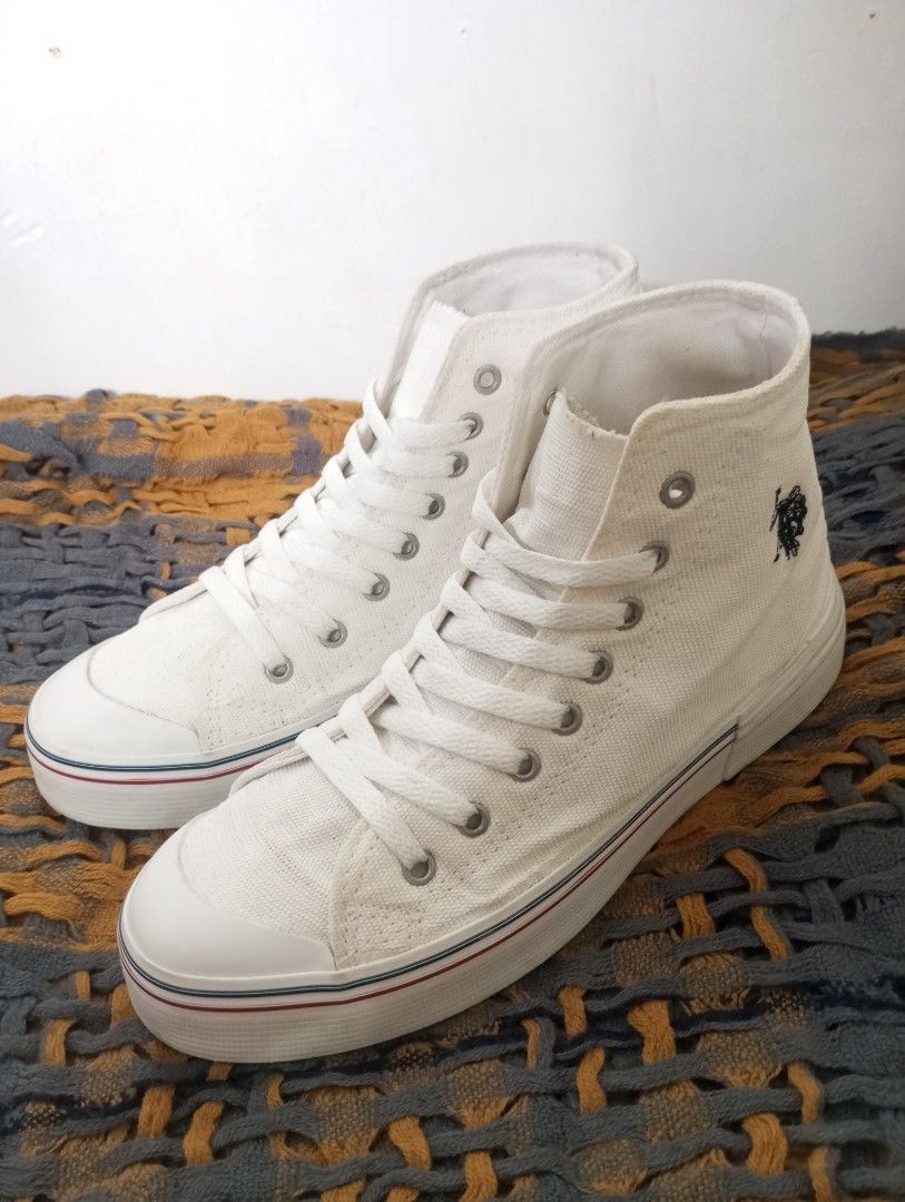 US Polo High Top Canvas Sneakers (Category: Sneakers) located in Baguio. Submitted by Dominick_II (Listing ID 1466776412, Image 1). Description: US Polo Assn white shoes Signature embroidered horse logo on the outer side Size : 7US men (fits 8.5 wmns) 40EU / 25CM / 6UK issue old tag made in Turkey Php 1,300 only.