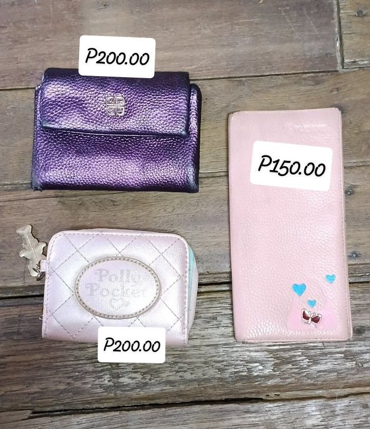 USED WALLET SET #3 (Category: Wallets & Card holders) located in Quezon City. Submitted by 4_leaf_clover (Listing ID 1466843592, Image 2). Description: USED CONDITION WALLETS SELLING AS IS PAYO LOC. QC / SDD-JNT DM.