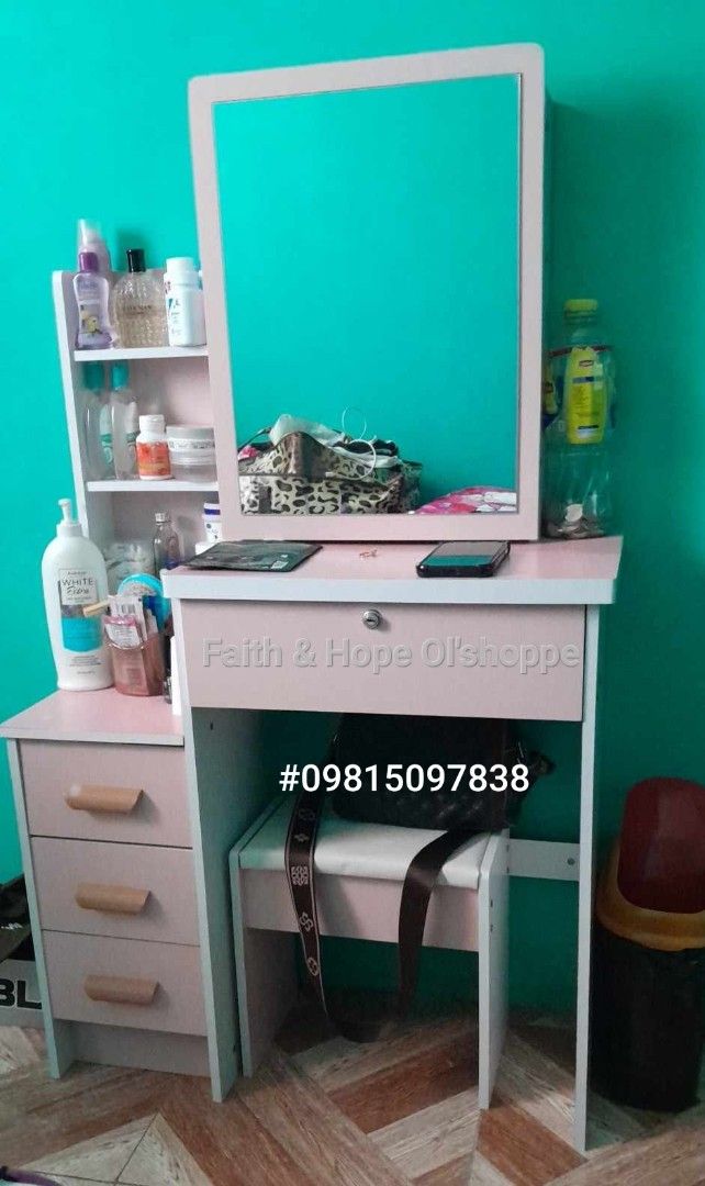 Vanity Table with Mirror and Stool (Category: Tables & Sets) located in Manila. Submitted by jamfrimzy089458 (Listing ID 1466843832, Image 3). Description: - Complete set: Includes dressing table, matching stool, mirror, and built-in storage drawers - Ample storage: Features multiple open side shelves for skincare and makeup - Secure main drawer: Spacious drawer comes with a key lock for privacy - Space-saving design: Compact size fits easily in 