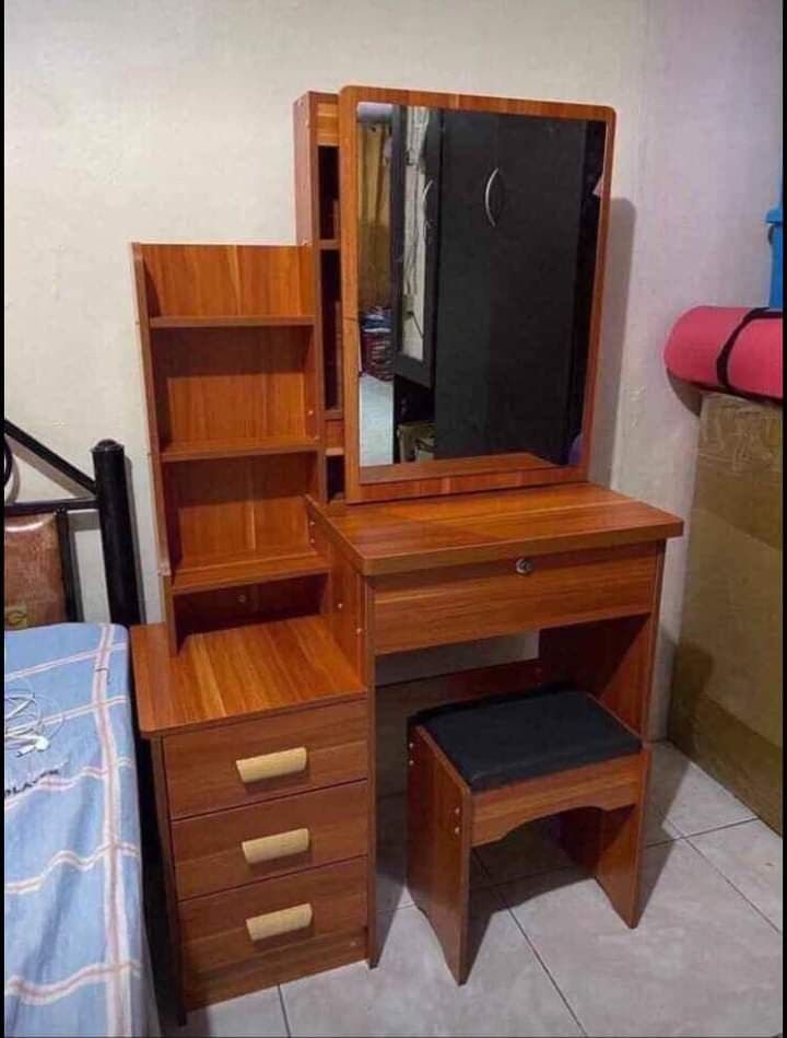 Vanity Table with Mirror and Stool (Category: Tables & Sets) located in Manila. Submitted by jamfrimzy089458 (Listing ID 1466843832, Image 1). Description: - Complete set: Includes dressing table, matching stool, mirror, and built-in storage drawers - Ample storage: Features multiple open side shelves for skincare and makeup - Secure main drawer: Spacious drawer comes with a key lock for privacy - Space-saving design: Compact size fits easily in 