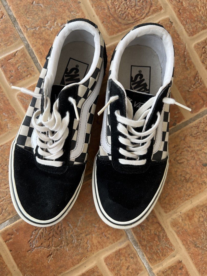 Vans Old Skool Checkered Black White Sneakers (Category: Sneakers) located in Tubigon. Submitted by gypsea.soulph (Listing ID 1466947788, Image 1). Description: - Brand: Vans Old Skool - Design: Black/White checkerboard pattern with black suede panels - Details: Signature white side stripe, white laces, and 'Off The Wall' rubber heel patch - Condition: Worn a few times, minor dirt on soles, lots of life left - Perfect for daily casual wear and sk