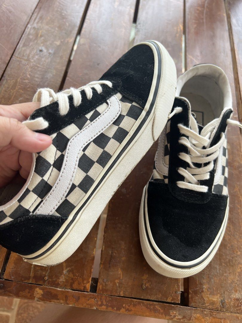 Vans Old Skool Checkered Black White Sneakers (Category: Sneakers) located in Tubigon. Submitted by gypsea.soulph (Listing ID 1466947788, Image 2). Description: - Brand: Vans Old Skool - Design: Black/White checkerboard pattern with black suede panels - Details: Signature white side stripe, white laces, and 'Off The Wall' rubber heel patch - Condition: Worn a few times, minor dirt on soles, lots of life left - Perfect for daily casual wear and sk