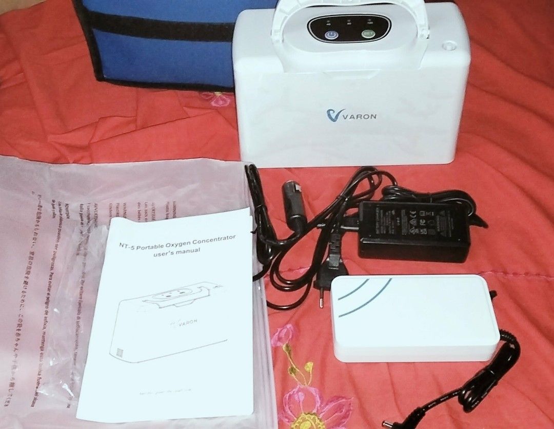 VARON NT-5 Portable Oxygen Concentrator with Accessories (Category: Medical Supplies & Tools) located in Valenzuela. Submitted by wilsonchuajr (Listing ID 1466968380, Image 1). Description: - Model: VARON NT-5 Portable Oxygen Concentrator (White) - Condition: Excellent, comes with original box - Power Options: Includes standard power adapters and car charger cable - Accessories: External battery pack and convenient carrying bag included - Documen
