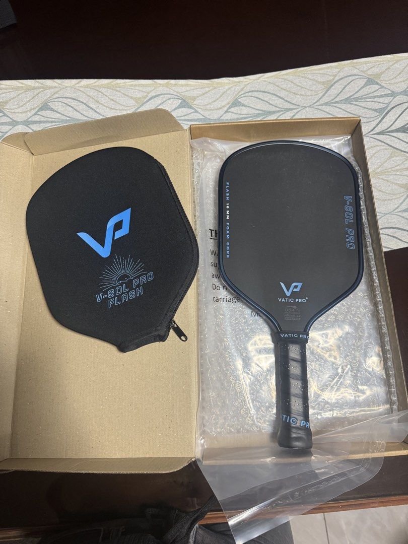 Vatic Pro V-Sol Pro Flash 16mm Pickleball Paddle (Category: Racket and Ball Sports) located in Quezon City. Submitted by gelagoo (Listing ID 1466907502, Image 1). Description: - Brand: Vatic Pro - Model: V-Sol Pro Flash (16mm foam core version) - Condition: Used for 1.5months 1-2x a week leisure play, with edge tape and overgrip since day 1 (removed overgrip now since di ko na ginagamit) - Inclusions: Original protective zip cover Rfs: Upgrade.