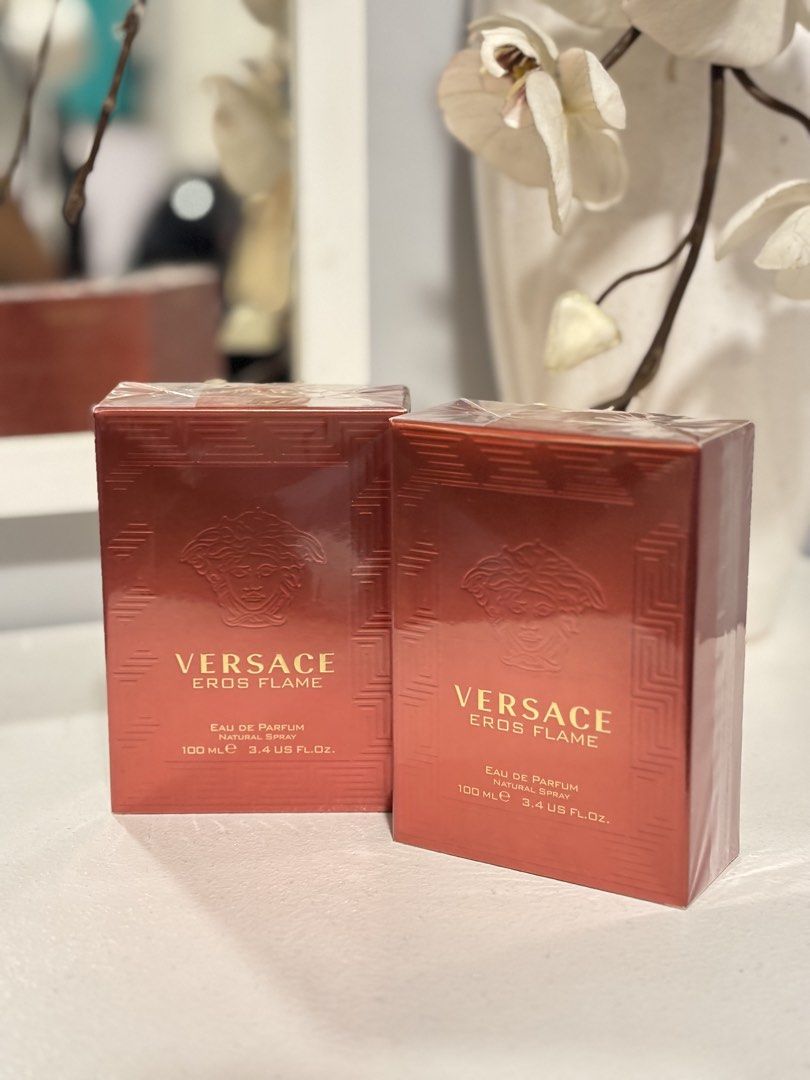Versace Eros Flame Eau de Parfum 100ml (Category: Fragrance & Deodorants) located in Taguig. Submitted by cheolito0000 (Listing ID 1466845271, Image 1). Description: - Brand: Versace Eros Flame Eau de Parfum - Quantity: 1 box (100ml / 3.4 US fl. oz. each) - Condition: Brand new, still sealed in original plastic wrapping - Details: Natural spray, Euroitalia distribution, striking red packaging with gold lettering and embossed Medusa logo - Perfect
