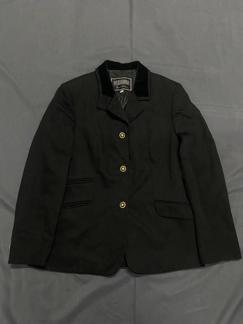 Versus Versace Black Wool Velvet Collar Blazer Jacket (Category: Coats, Jackets and Outerwear) located in Santa Maria. Submitted by saintarchive316 (Listing ID 1466889579, Image 1). Description: - Brand: Versus Versace (Vintage) - Made in Italy by Ittierre S.p.A. - Color: Black with velvet collar detail - Material: 98% Virgin Wool, 2% Cotton - Size: IT 40 - Details: Gold-tone front buttons, structured shoulders, tailored fit - Condition: Great ad