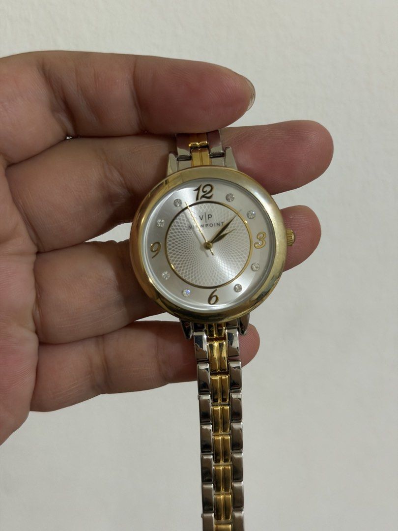 Viewpoint Women's Two-Tone Watch (Category: Women's Watches) located in Binan City. Submitted by prelovedlagunaph (Listing ID 1466968320, Image 3). Description: - Brand: Viewpoint - Design: Silver and gold-tone two-tone bracelet - Dial: Textured silver face with crystal hour markers & numerals at 12, 3, 6, 9 - Back & Water Resistance: Stainless steel back, water-resistant up to 30 meters - Closure: Standard clasp - Battery: SR626SW cell battery (