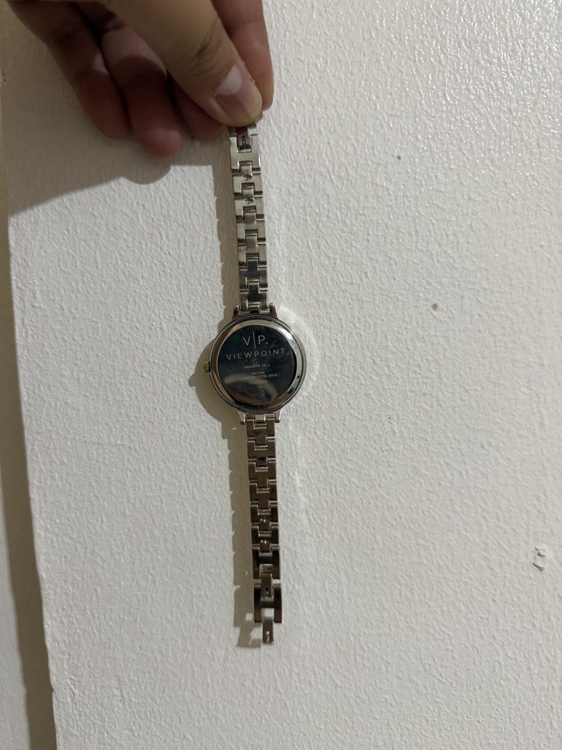 Viewpoint Women's Two-Tone Watch (Category: Women's Watches) located in Binan City. Submitted by prelovedlagunaph (Listing ID 1466968320, Image 2). Description: - Brand: Viewpoint - Design: Silver and gold-tone two-tone bracelet - Dial: Textured silver face with crystal hour markers & numerals at 12, 3, 6, 9 - Back & Water Resistance: Stainless steel back, water-resistant up to 30 meters - Closure: Standard clasp - Battery: SR626SW cell battery (