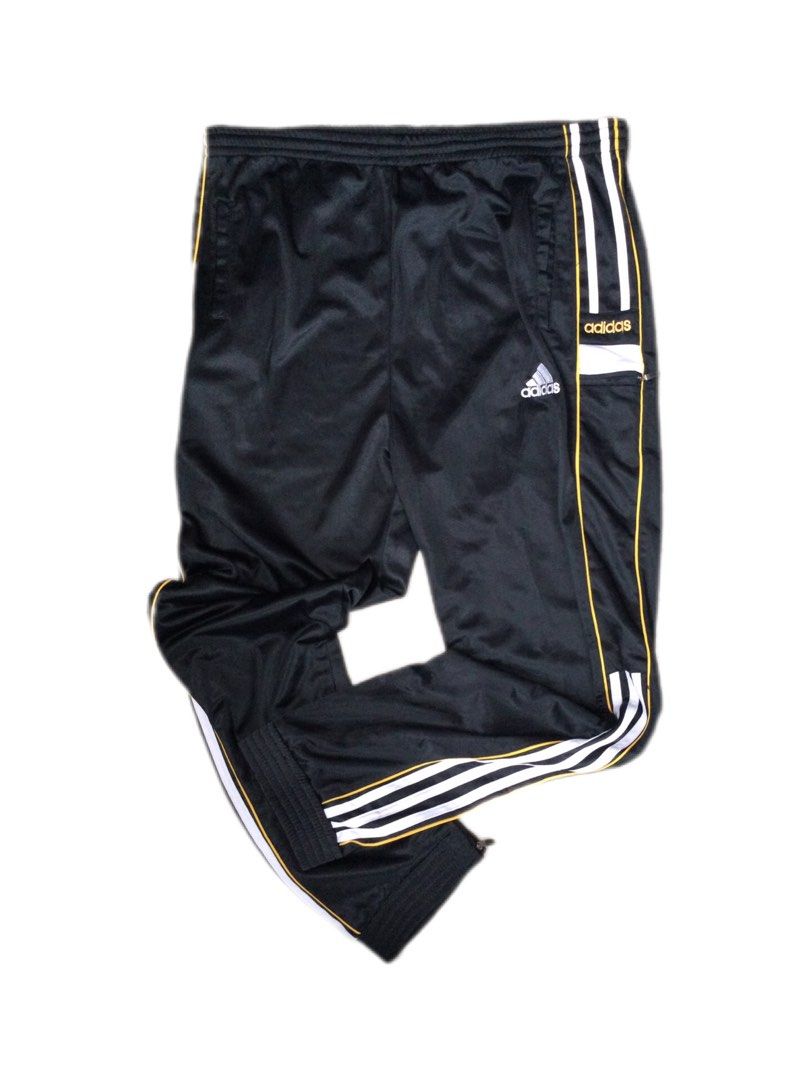 Vintage Bootleg Adidas Track Pants (Category: Joggers) located in Binangonan. Submitted by ininnep (Listing ID 1466925977, Image 1). Description: ✅ Item Identified: Vintage Adidas Classic 3-Stripes Track Pants 🏃‍♂️ Brand: Adidas —with embroidered trefoil logo, branded text,engraved zipper Size -32 to 40 Style Details: • Colorway: Black base with iconic white 3-Stripes + gold/yellow piping • Features: Elastic waistband, side hand pockets, zippere