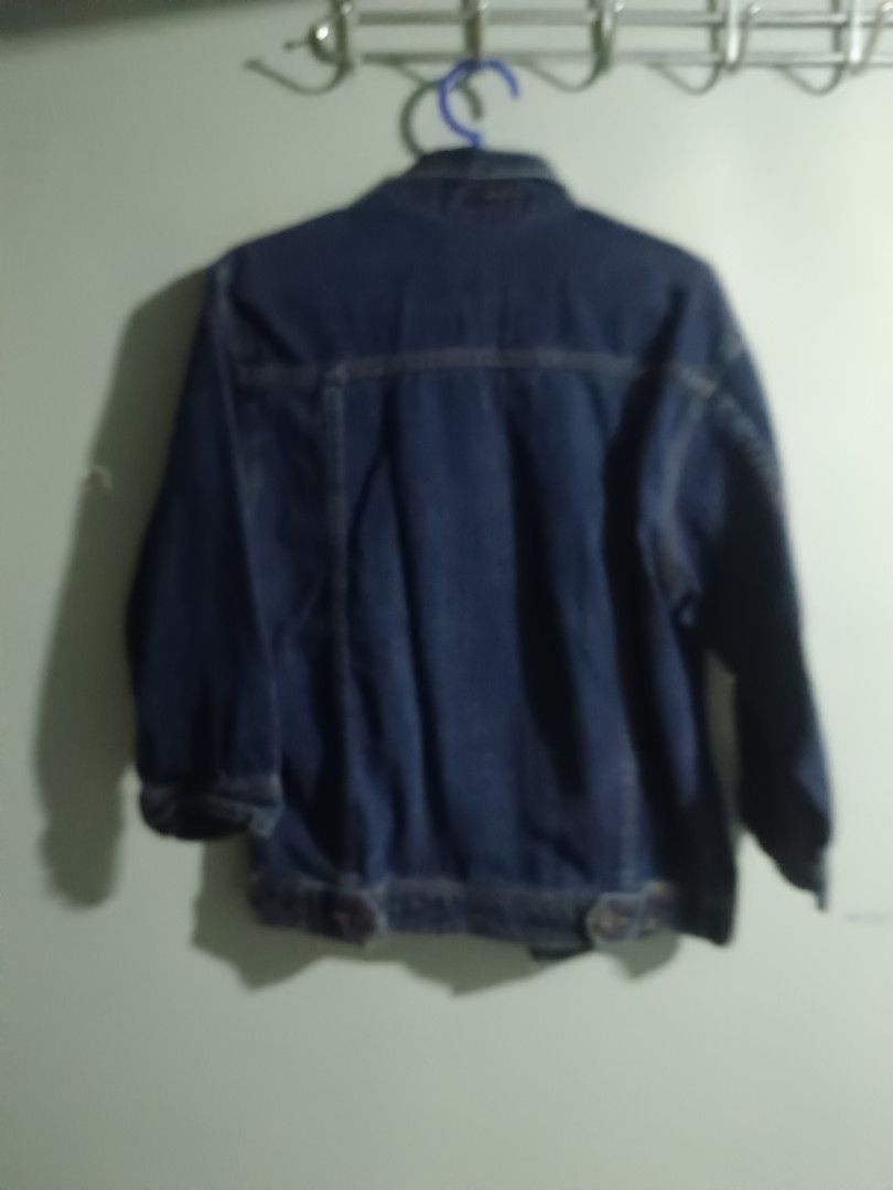 Vintage Dark Blue Denim Jacket With Pockets (Category: Coats, Jackets and Outerwear) located in Trece Martires City. Submitted by fleurdelis.67 (Listing ID 1466904273, Image 2). Description: - Color: Dark blue - Material: Comfortable mid-weight denim - Design: Classic collar and contrast stitching - Closure: Metal button front - Pockets: Functional front pockets - Fit: Standard fit - Best for: Great layering piece for cooler weather.