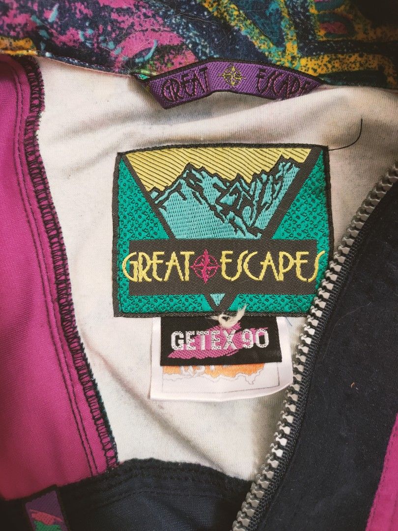 Vintage Great Escapes Getex 90 Fleece Pullover Jacket (Category: Coats, Jackets and Outerwear) located in Manila. Submitted by afforlux (Listing ID 1466787050, Image 3). Description: - Brand: Great Escapes (Getex 90) - Style: Retro 90s outdoor fleece pullover - Color/Design: Bright pink with black and multi-colored geometric pattern on chest and collar - Features: Quarter-zip front, front zipper pockets, and adjustable drawstring hem - Material: 
