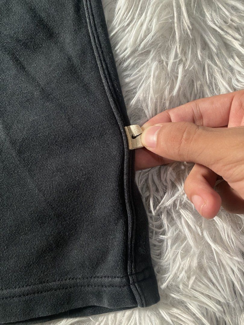 Vintage Nike Black Sweatpants Drawstring Joggers (Category: Joggers) located in Mendez-Nunez. Submitted by leighthrift (Listing ID 1466892234, Image 3). Description: NIKE VINTAGE SWEATPANTS DIMES: WAIST: OSFA ( ONE SIZE FITS ALL ) LENGTH: 40 THIGH: 15 HEM: 10 ISSUE: LINTS - Vintage 2006 Nike sweatpants (verified via inside wash tag) - Color: Classic Black - Fit: Relaxed fit through the legs with an adjustable drawstring waist - Branding: Iconic e