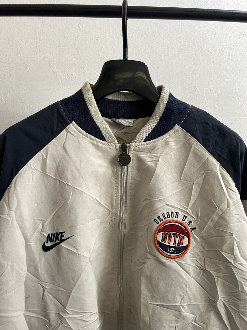 Vintage Nike Bomber Jacket (Category: Coats, Jackets and Outerwear) located in Virac. Submitted by _thecave (Listing ID 1466834408, Image 2). Description: Vintage Nike Bomber Jacket Excellent Stains (normal due to age) Tagged Size: XL Width: 24 Length: 28 P750 + SF.