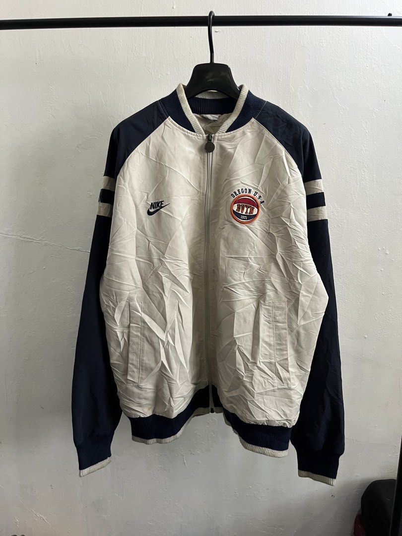 Vintage Nike Bomber Jacket (Category: Coats, Jackets and Outerwear) located in Virac. Submitted by _thecave (Listing ID 1466834408, Image 1). Description: Vintage Nike Bomber Jacket Excellent Stains (normal due to age) Tagged Size: XL Width: 24 Length: 28 P750 + SF.
