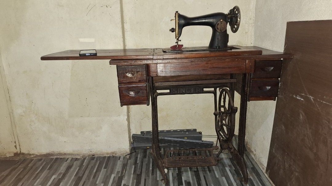 Vintage Singer 15K Treadle Sewing Machine (Category: Tables & Sets) located in Paranaque City. Submitted by reben_0430 (Listing ID 1466874437, Image 1). Description: THE PRICE IS TO ONLY ATTRACT BUYERS HEARING OFFERS🙌🙌🙌 Vintage Singer 15K Treadle Sewing Machine Serial no. EP792151. Genuine antique. issues: working pa naiikot pa, nasira lang yung belt and yung overall rust. location: Masville, Parañaque.
