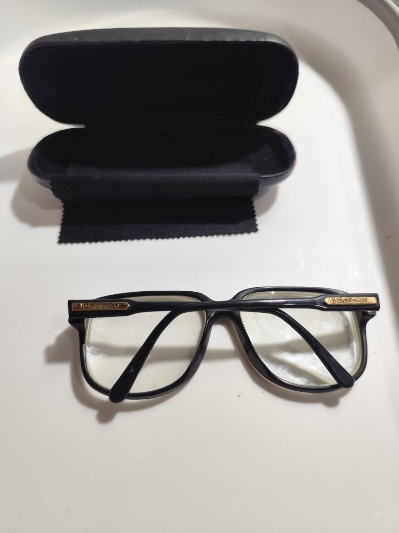 Vintage Yves Saint Laurent frame (Category: Sunglasses & Eyewear) located in Cebu City. Submitted by icoolectnsellect (Listing ID 1466906219, Image 2). Description: Issue: Minor Scratch, Dirt and RX lens, medyo malaki yung opening nya sa temple or bka nkabukaka na. Bought at Garage Sale. Authenticity not Guaranteed, di ko alam if legit or Fake. Buy @ your own Risk. All EyeGlasses or Sun Glasses ay may Grado or Prescription Glasses. Please be care