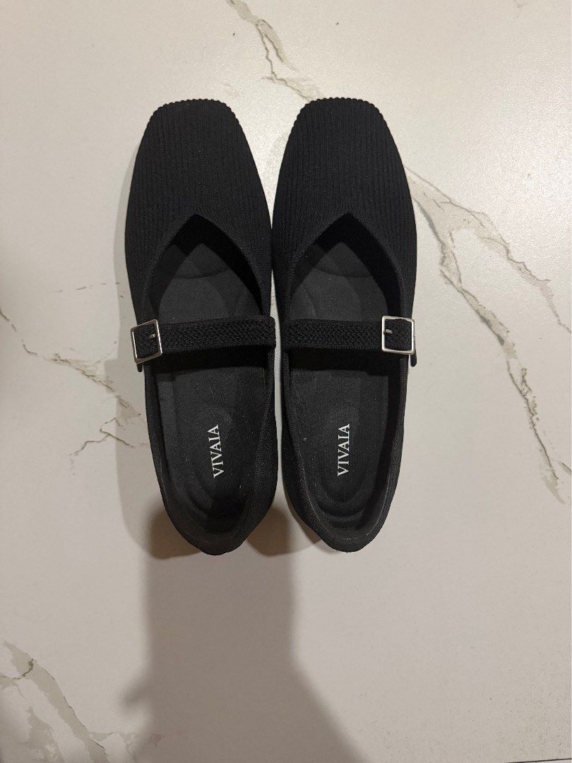 VIVAIA Black Mary Jane Flats (Category: Flats & Sandals) located in Manila. Submitted by jlssntg (Listing ID 1466914471, Image 1). Description: - Brand: VIVAIA - Style: Black Mary Jane flats with trendy square toes - Material: Comfortable ribbed knit upper - Details: Adjustable strap with a sleek silver metal buckle - Condition: Excellent, clean soles and footbeds - Perfect for work, casual outings, or daily commuting!.