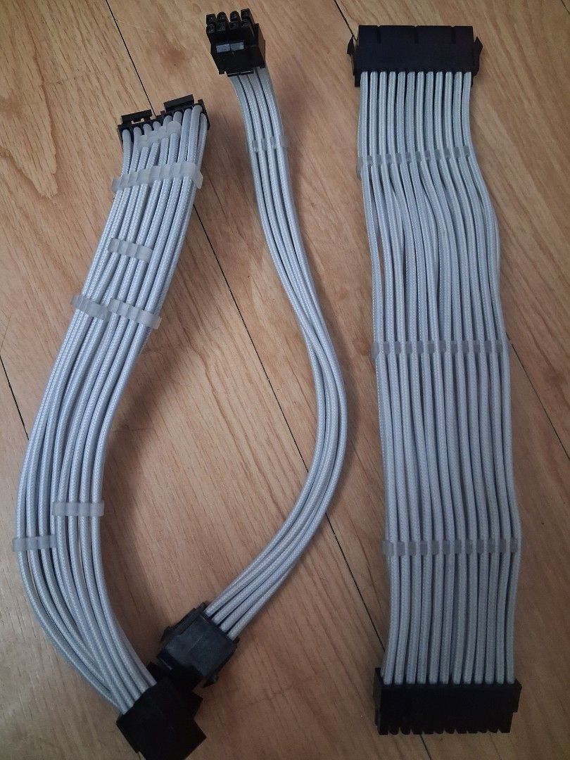White Braided PC Cable Extensions Set (Category: Cables & Adaptors) located in Manila. Submitted by hyper_gamer (Listing ID 1466859511, Image 1). Description: - White braided PSU cable extensions for a clean custom PC look - Includes 1x 24-pin motherboard cable - Includes 1x 8-pin CPU cable - Includes 1x 8-pin PCIe graphics card cable - Clear cable combs already installed for neat and organized wire management - Bought in the USA..