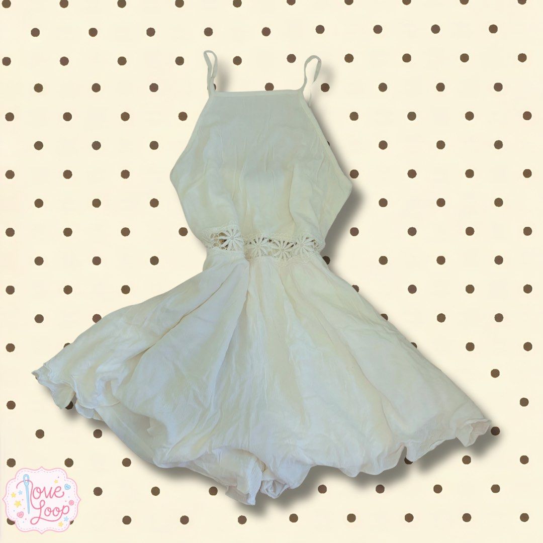 White Crochet Trim Halter Neck Romper (Category: Rompers) located in Manila. Submitted by love.loop (Listing ID 1452782159, Image 1). Description: - Cute white romper - Halter neck design - Crochet trim detail at the waist - Lightweight and flowy fabric - Adjustable spaghetti straps - Short length - Ideal for beach days or casual outings.