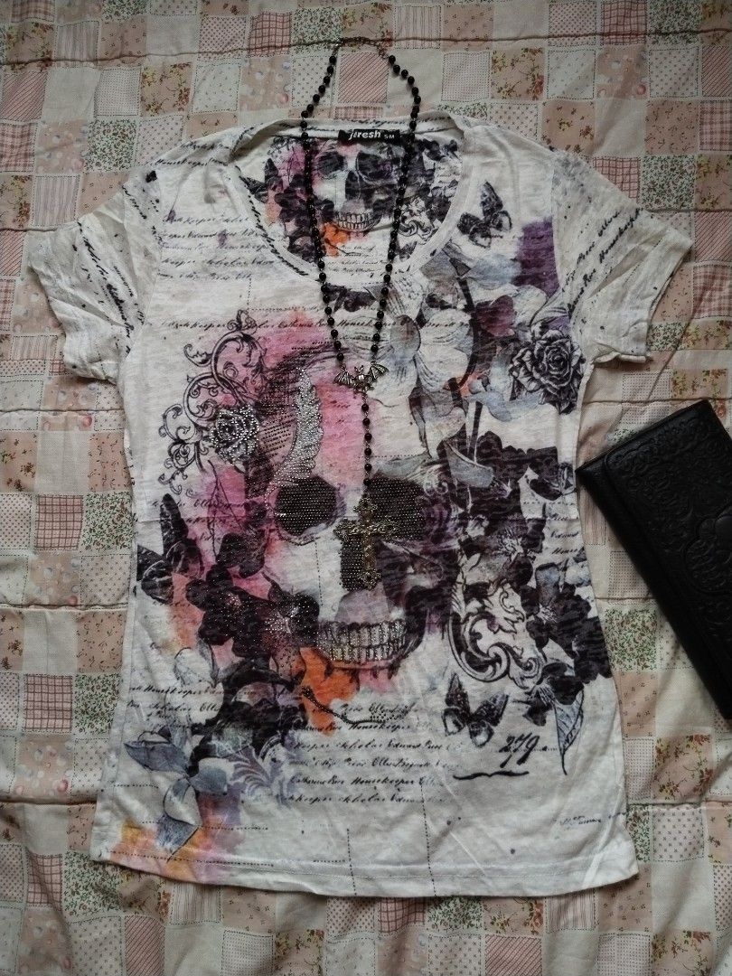 White graphic beaded skull alternative shirt (Category: Shirts) located in Cebu City. Submitted by thrift_with_anjel (Listing ID 1466886367, Image 1). Description: ❀.ೃ࿔White graphic beaded skull shirt❀.ೃ࿔* 🌹Brand: firesh 🌸Bust: 30-38 🌸Waist: 26-34 🌷Mine: 650(AU).