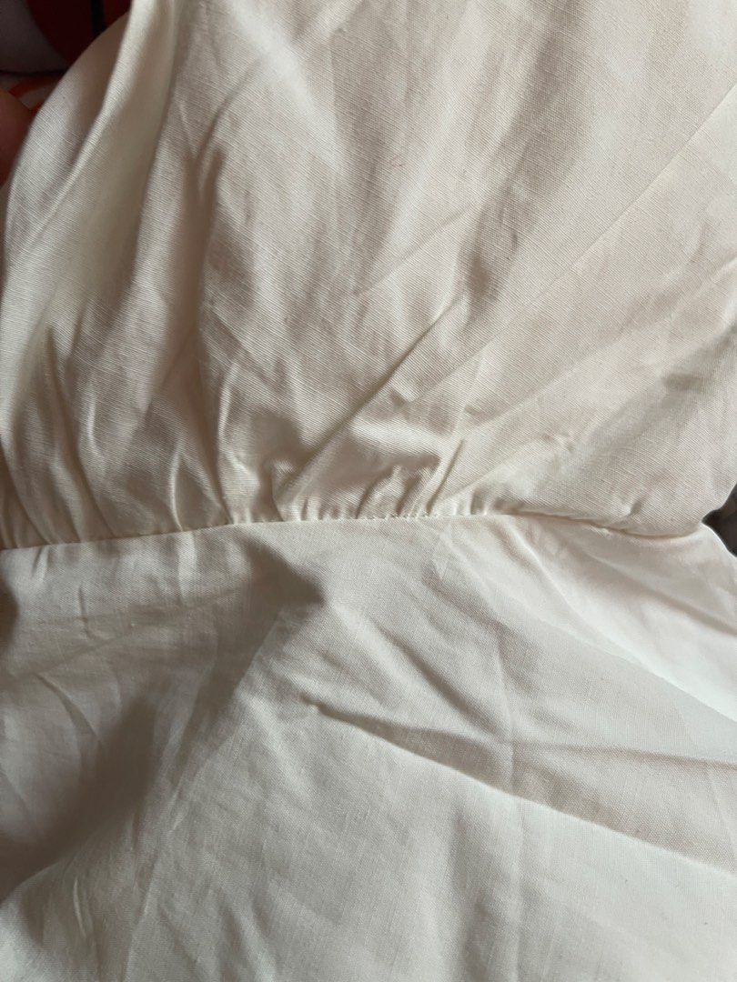 White Puff Sleeve Blouse (Category: Blouses) located in Toledo. Submitted by klnmia (Listing ID 1466863545, Image 3). Description: - Color: Classic White - Design: Dramatic voluminous puff sleeves with a round neckline - Fit: Relaxed, boxy cut through the body - Material: Lightweight, breathable woven fabric - Finish: Clean finished hems inside and out - Styling: Versatile piece, easy to pair with casual trousers or skirts.