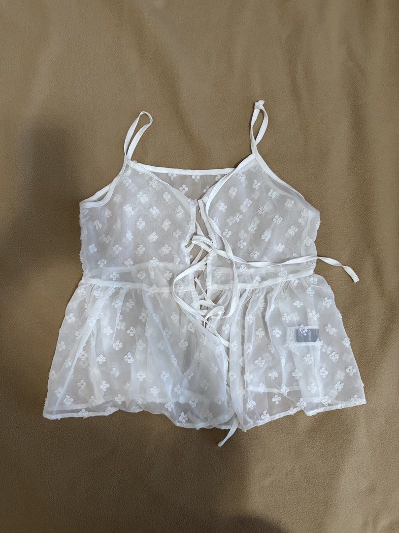 White Top Sleeveless (Category: Others Tops) located in San Luis. Submitted by oshdeclutters (Listing ID 1466814071, Image 1). Description: .