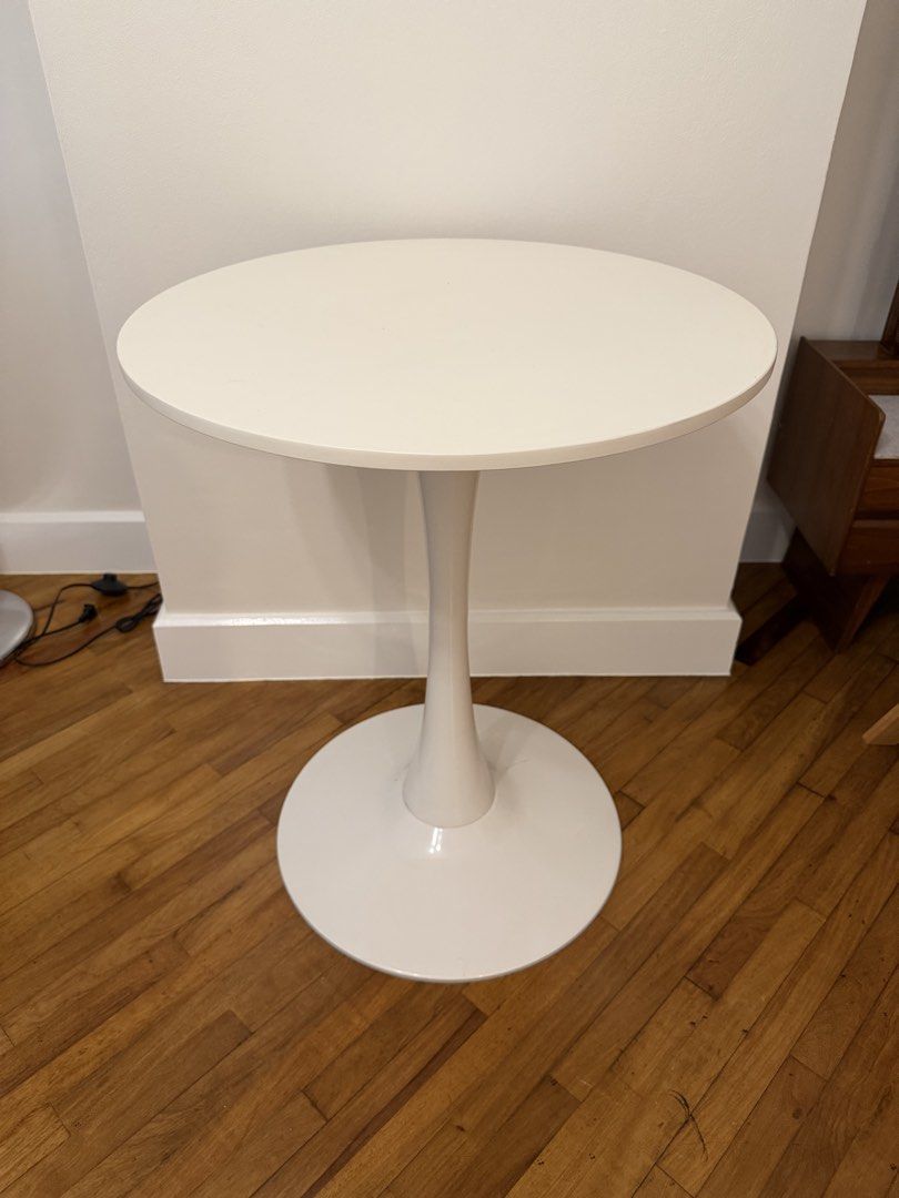 White Tulip Table Round Pedestal (Category: Tables & Sets) located in Manila. Submitted by goldenrabbit_605125 (Listing ID 1466825194, Image 1). Description: Pick up at Rockwell Makati - Style: Clean minimalist white round tulip table - Base: Sturdy single central pedestal that prevents wobbling - Surface: Smooth top that is easy to wipe clean - Ideal Use: Perfect for small dining spaces or a cozy coffee corner setup - Height: Standard counter he