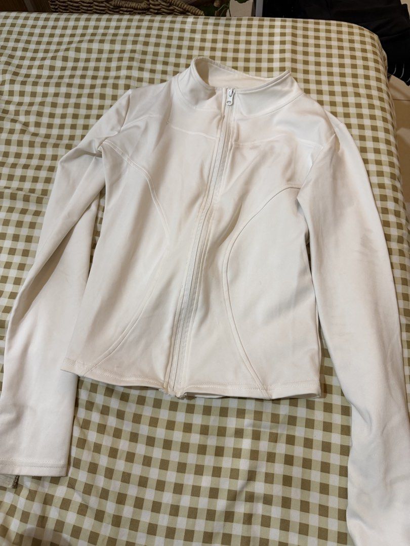 White Zip-Up Athletic Jacket with Thumbholes (Category: Activewear) located in Pasig City. Submitted by deedee235 (Listing ID 1466882849, Image 2). Description: Has stain on left chest (see last photo).